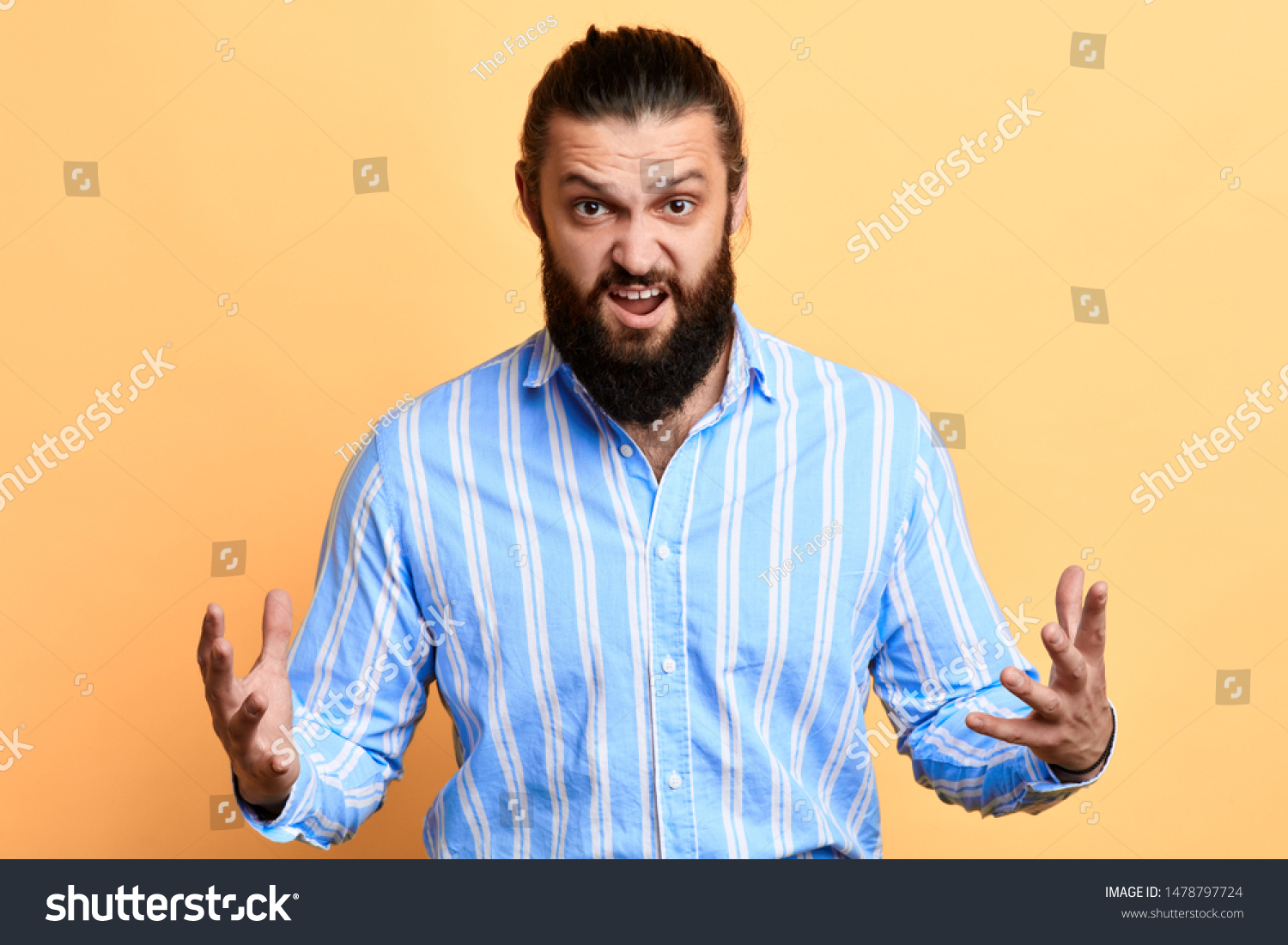 frustrated stylish man with open mouth expressing negative emotion. frustration concept. isolated yellow background #1478797724