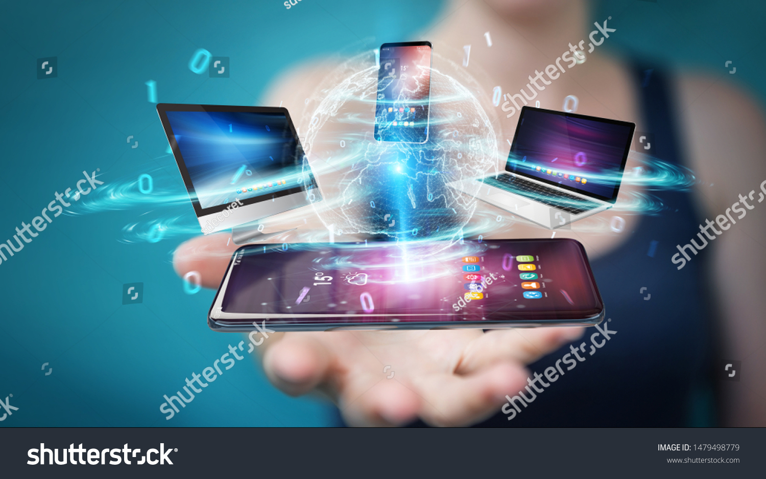 Modern devices connected to each other in businesswoman hand 3D rendering #1479498779