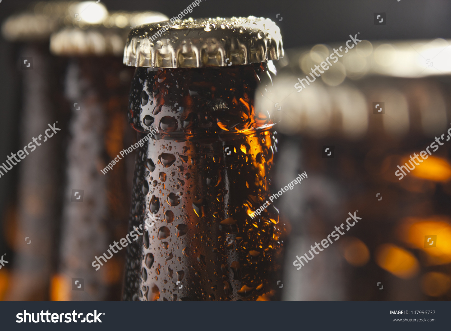 The group of wet bottles of beer #147996737