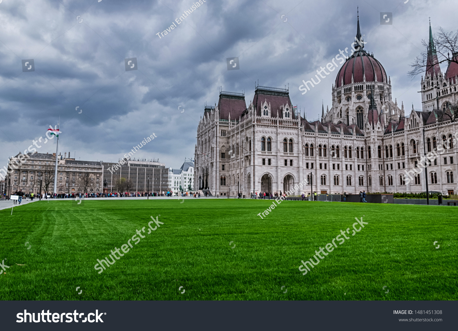 The Hungarian Parliament Building viewed from the grass covered Kossuth Square on a cloudy autumn afternoon #1481451308