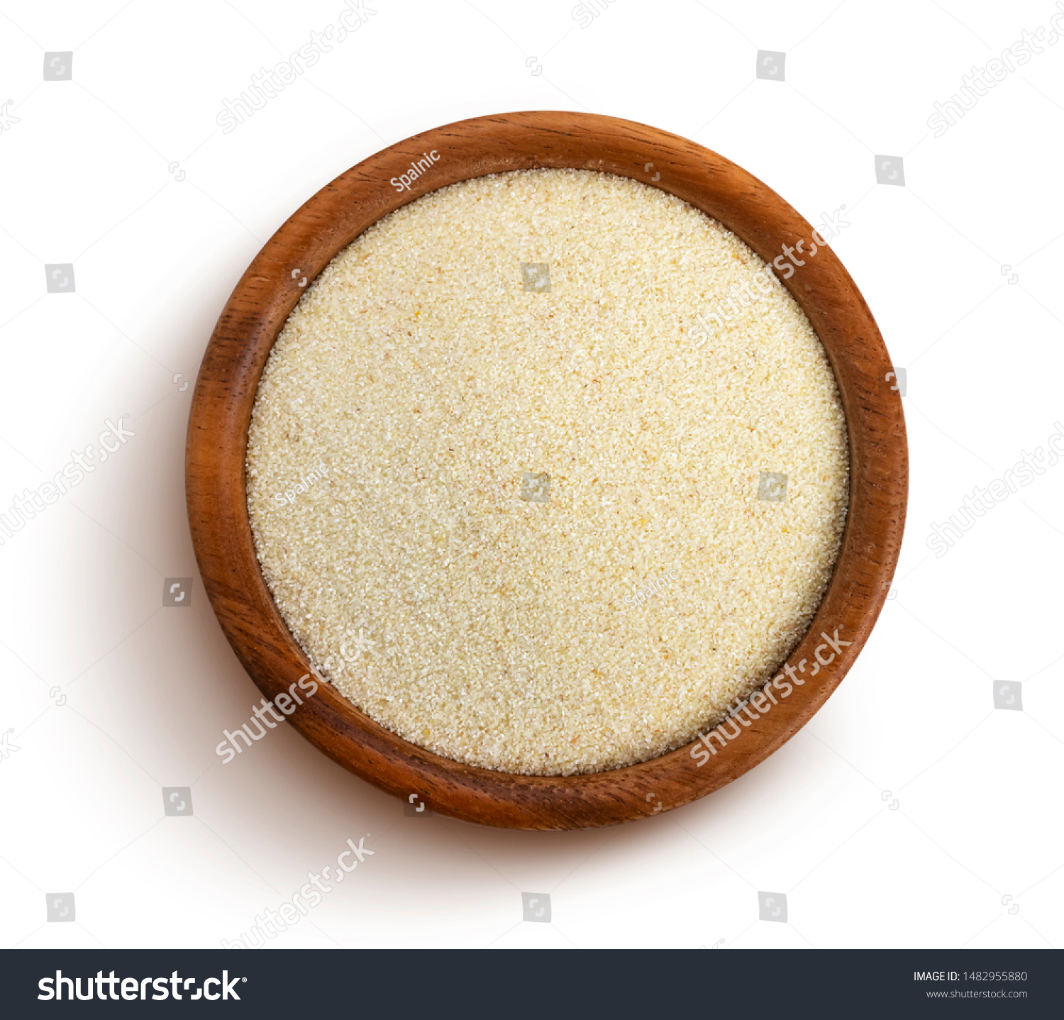Semolina isolated on white background, raw semolina porridge in rustic wooden bowl, top view #1482955880