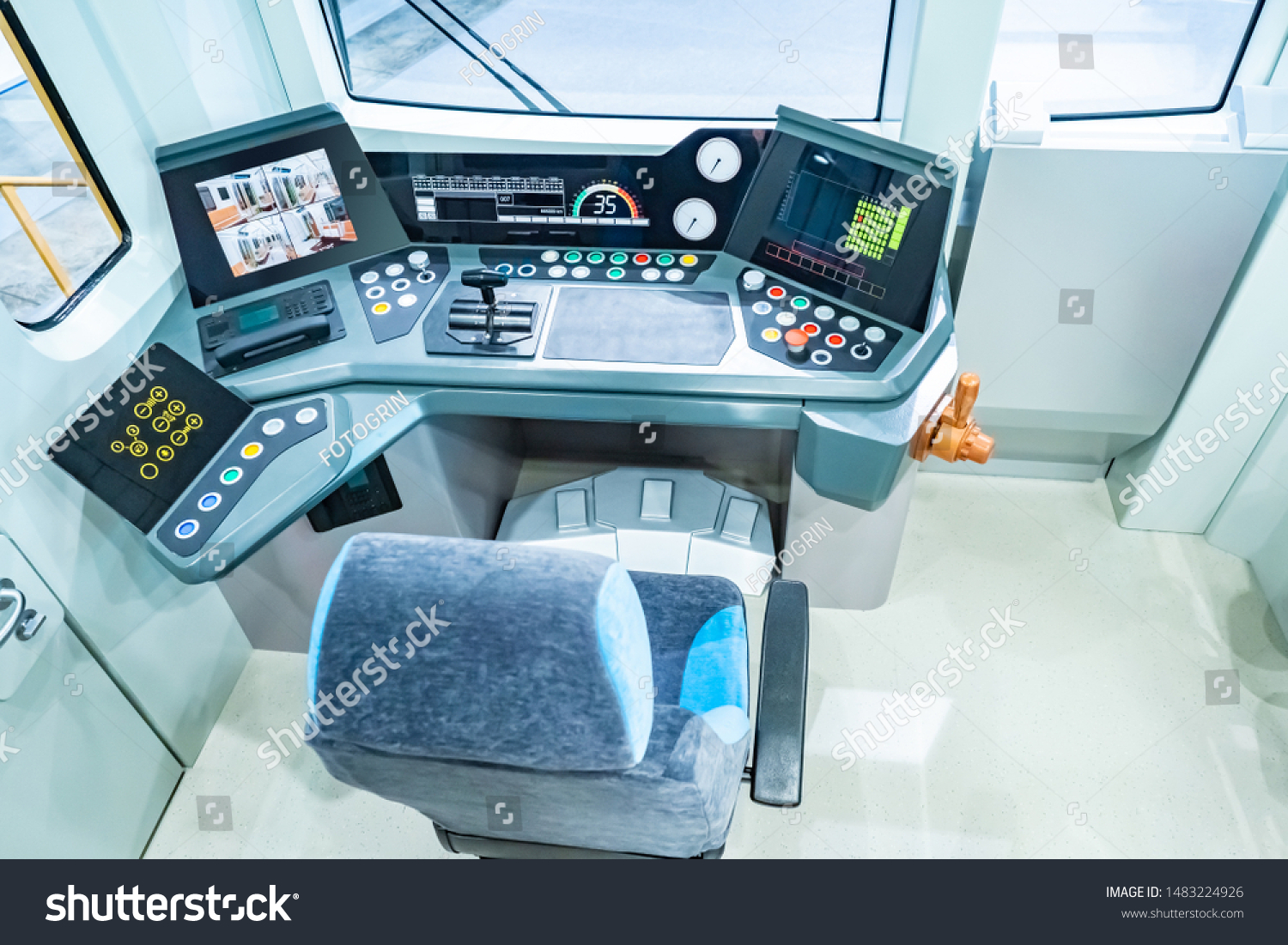 The cabin of the electric train. Driver place of the electric train. Dashboard. The control cabin of the electric train. Railway suburban transport. Passenger transport. Suburban transport network. #1483224926