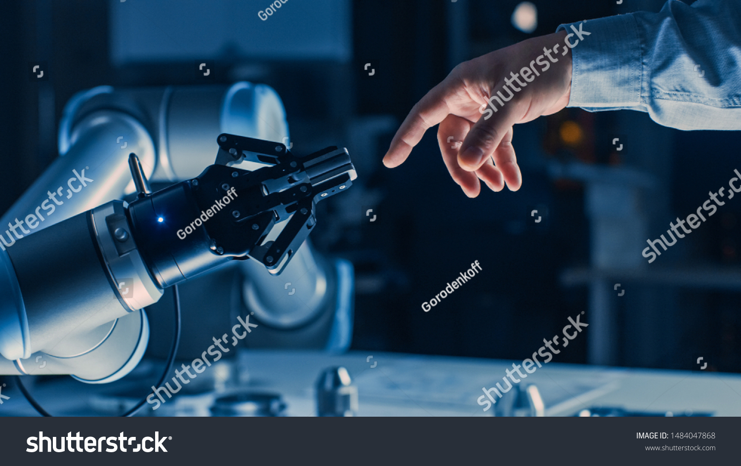 Futuristic Robot Arm Touches Human Hand in Humanity and Artificial Intelligence Unifying Gesture. Conscious Technology Meets Humanity. Concept Inspired by Michelangelo's Creation of Adam #1484047868