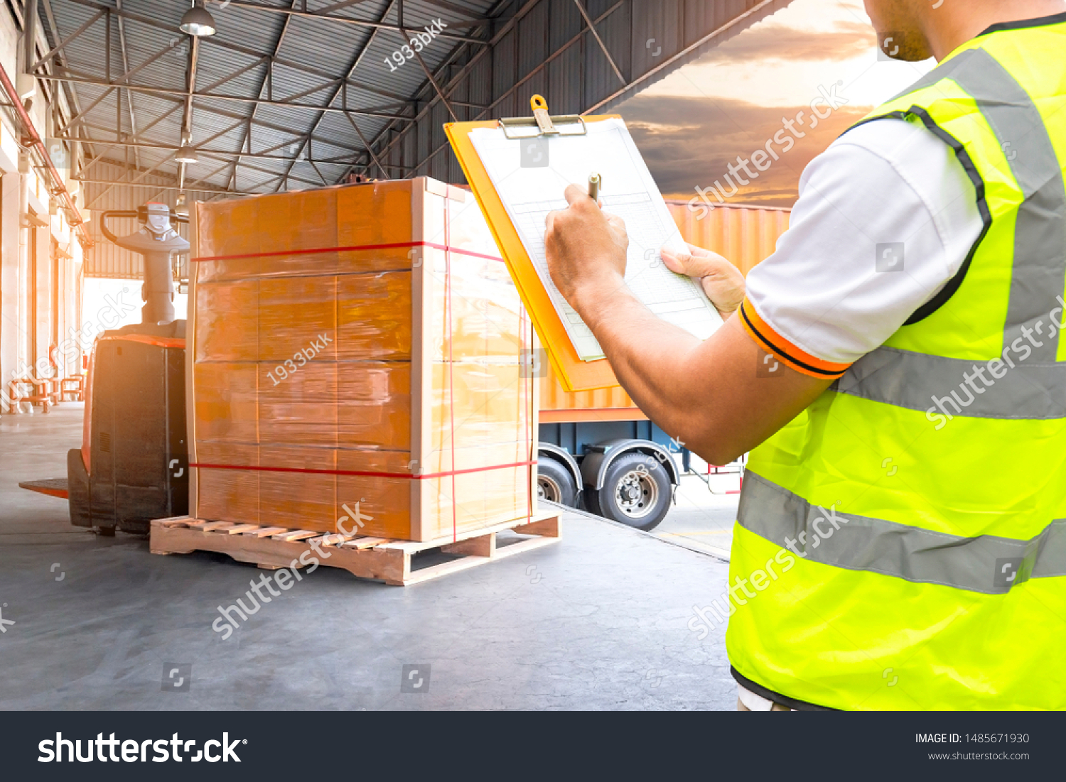 Workers Holding Clipboard is Checking Stock of Package Boxes. Storage Warehouse. Inventory Management Supplies. Supply Chain. Shipment Goods Shipping Warehouse Logistics.	 #1485671930