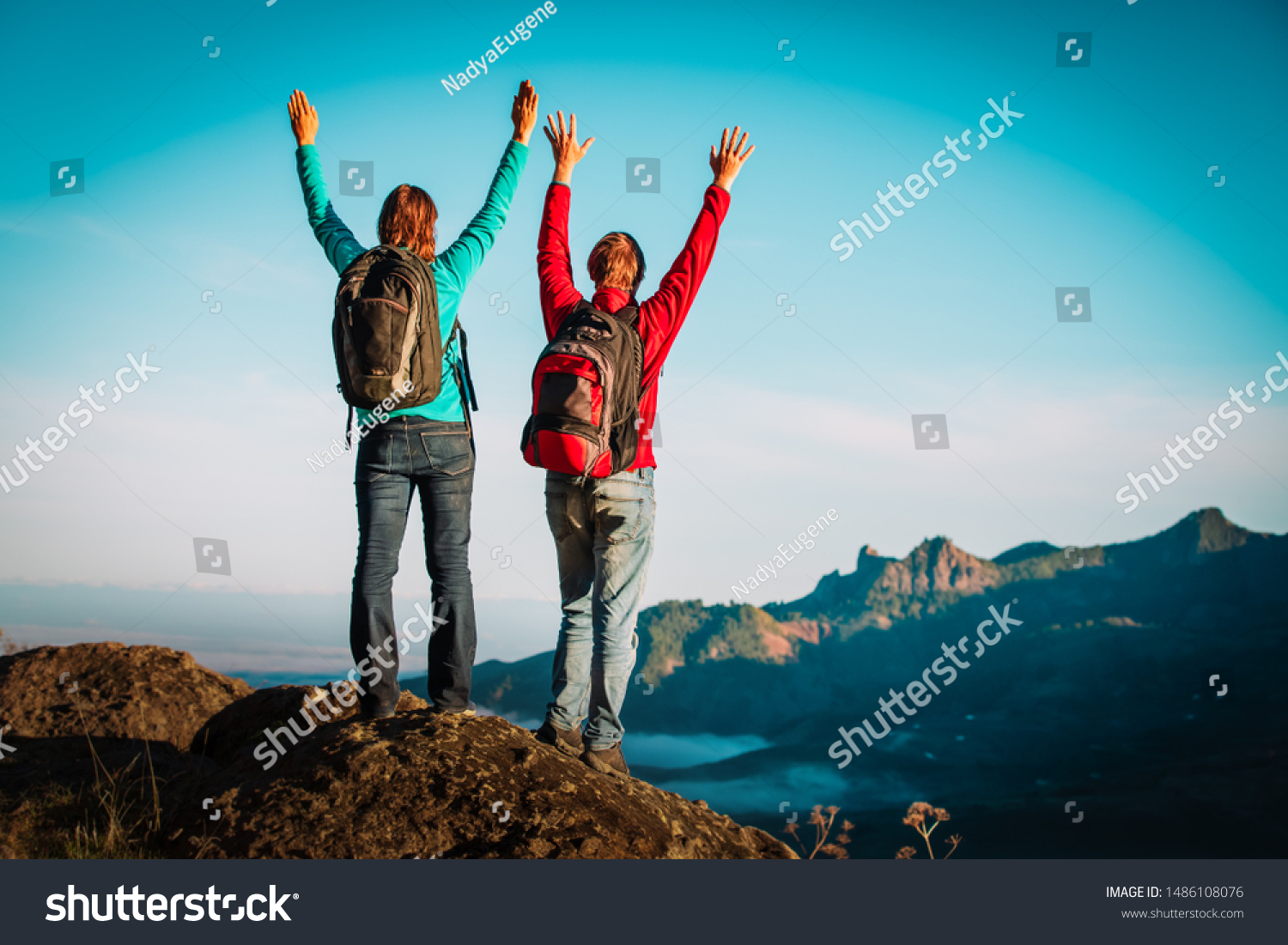 happy loving couple hiking travel in mountains #1486108076
