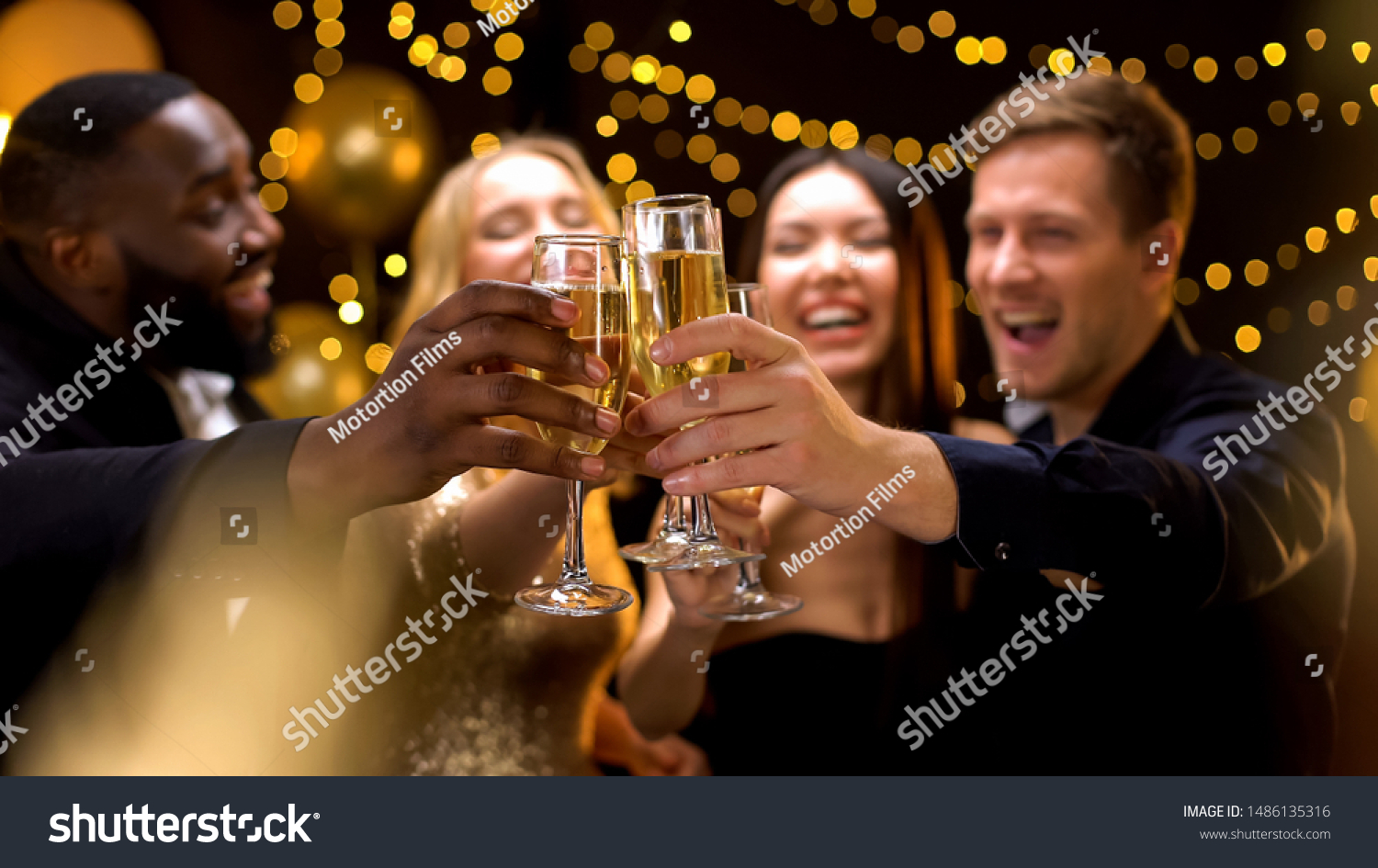 Happy multi-ethnic company clinking beverage glasses, celebrating New Year #1486135316