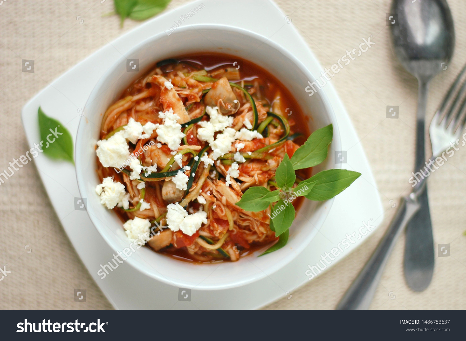 Zucchini spaghetti in sauce with tomato, basil, meat and cheese #1486753637