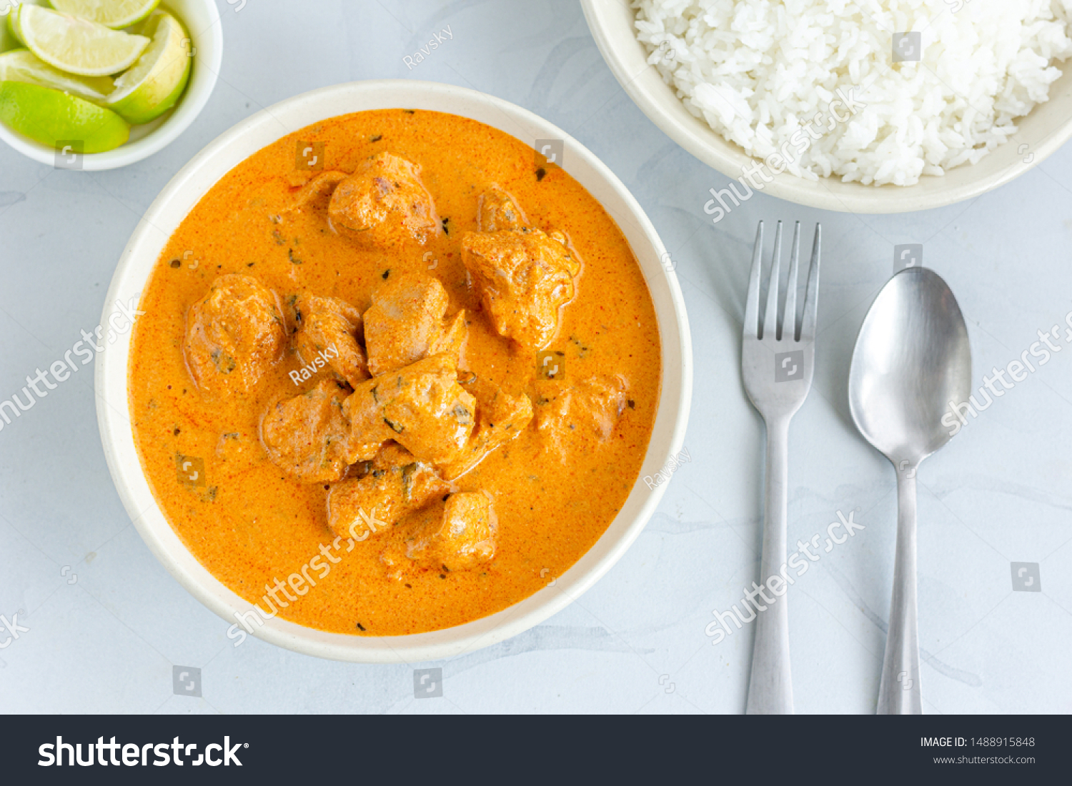 Traditional Indian Butter Chicken with Rice Top View Photo. Creamy Indian Chicken Curry on White Background. #1488915848