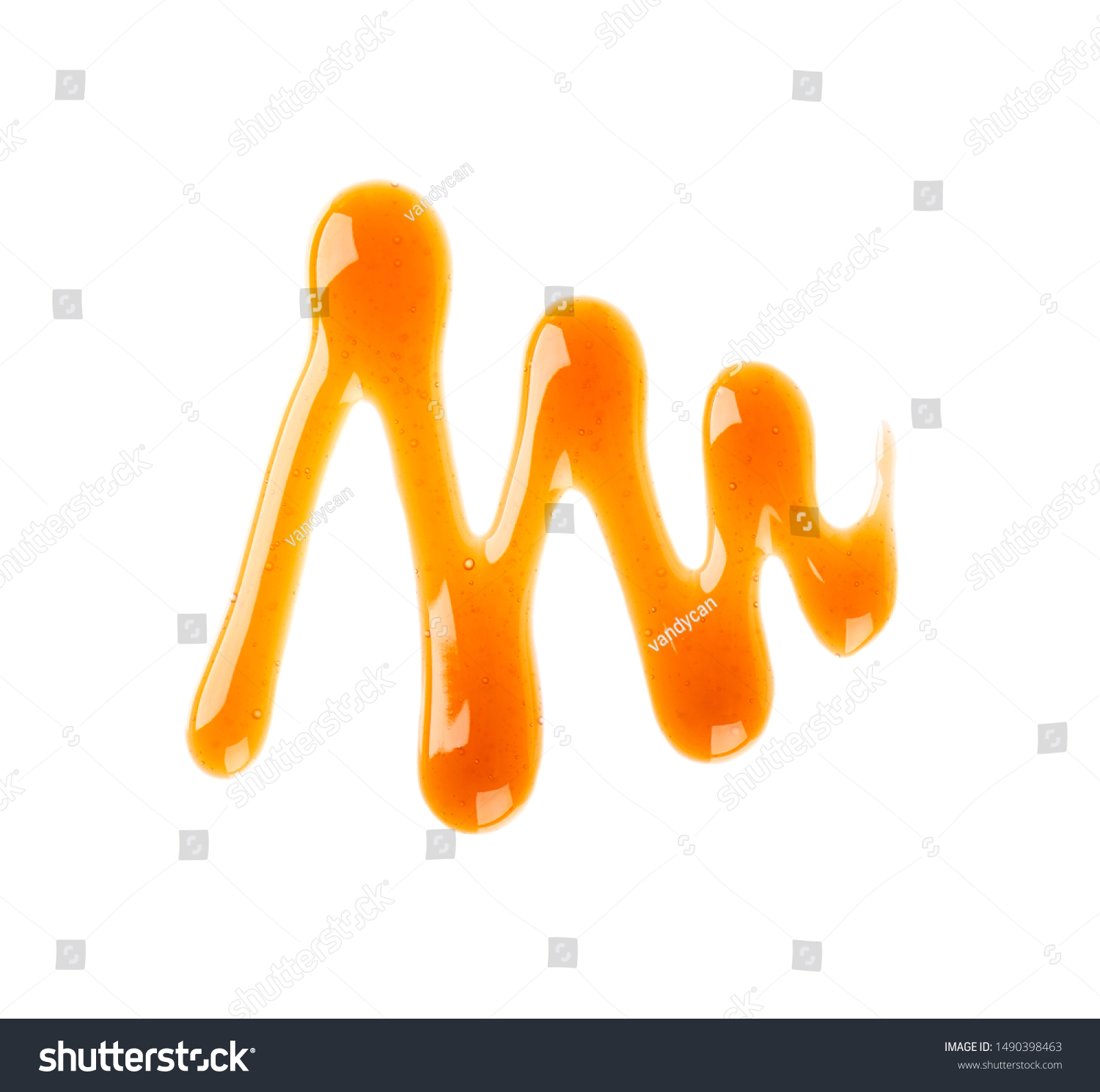 Caramel syrup drizzle isolated on white background. Splashes of sweet caramel sauce. Top view. #1490398463