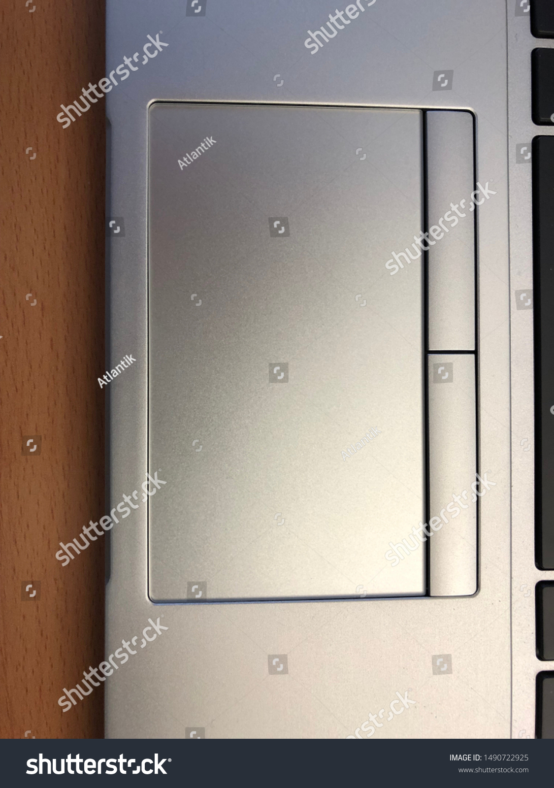 Silver laptop touch pad with two buttons #1490722925