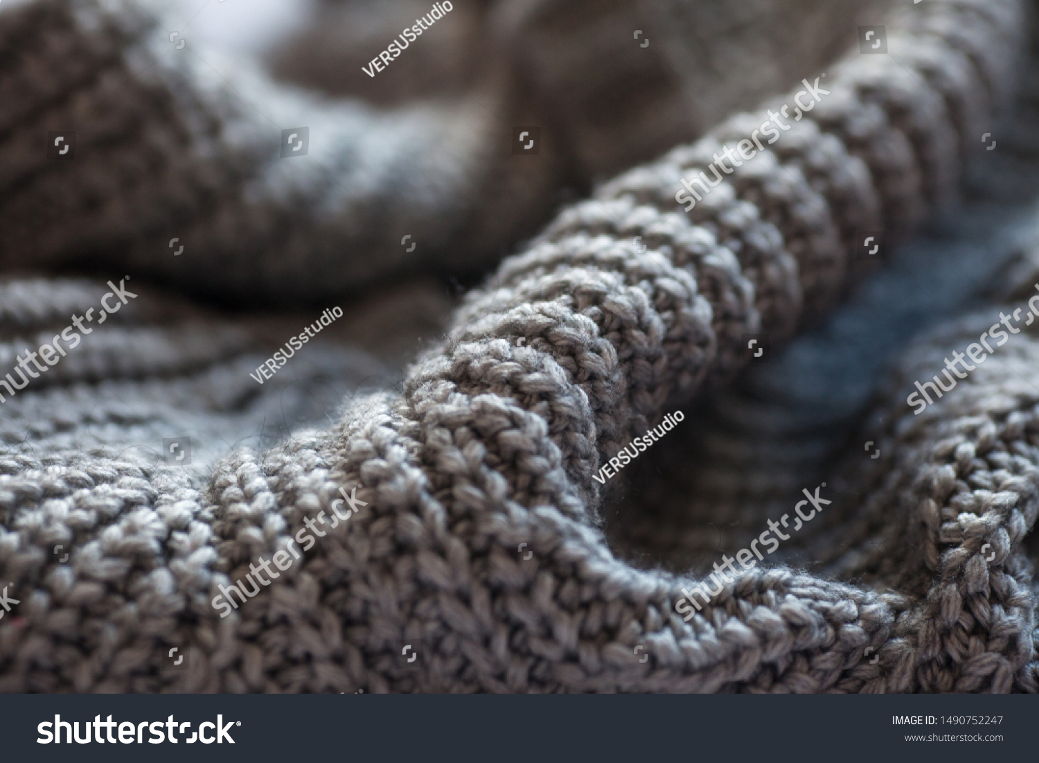 Wool fabric texture close up background. Cozy style cloth. Wavy folds material #1490752247