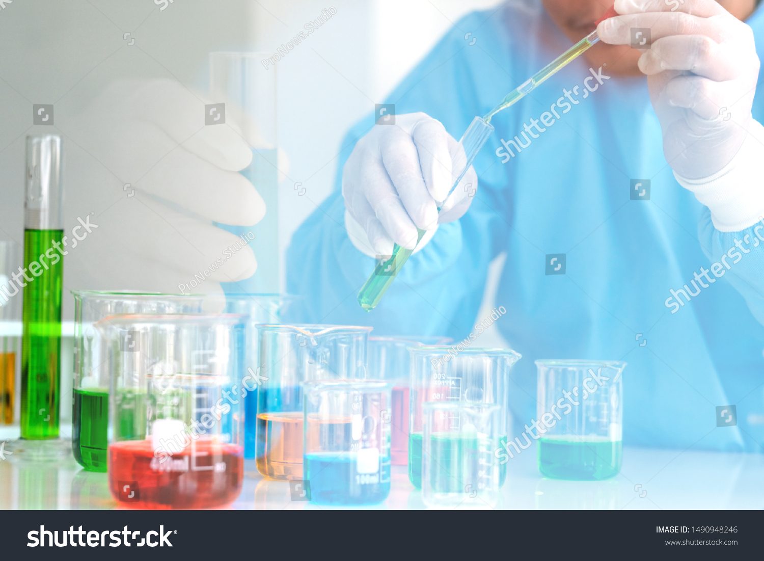Medical and science researching concept. Scientist is using pipet during the researching. #1490948246