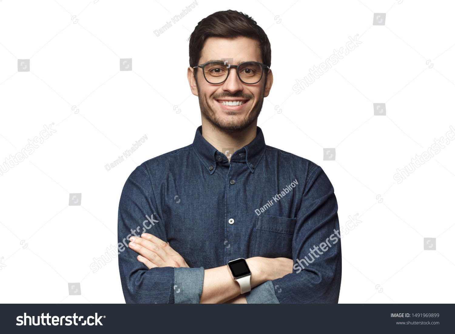 Portrait of young smiling caucasian man with crossed arms, wearing smart watch and casual denim shirt, isolated on white  #1491969899