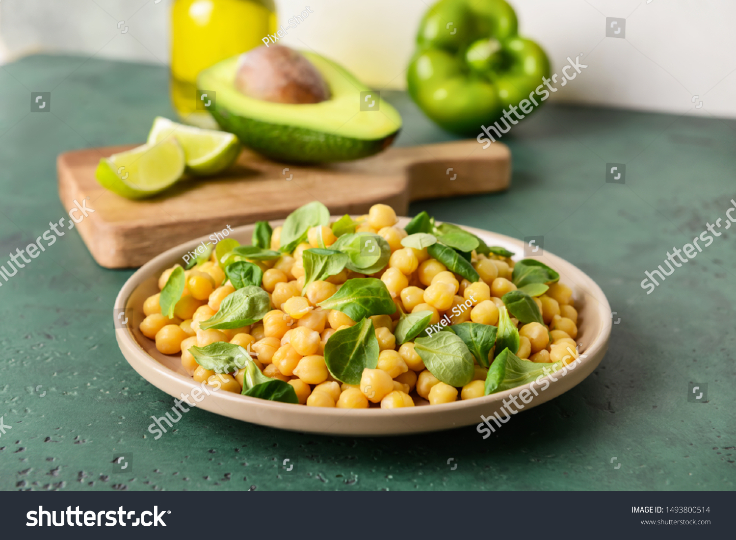 Plate with tasty tasty chickpea on table #1493800514