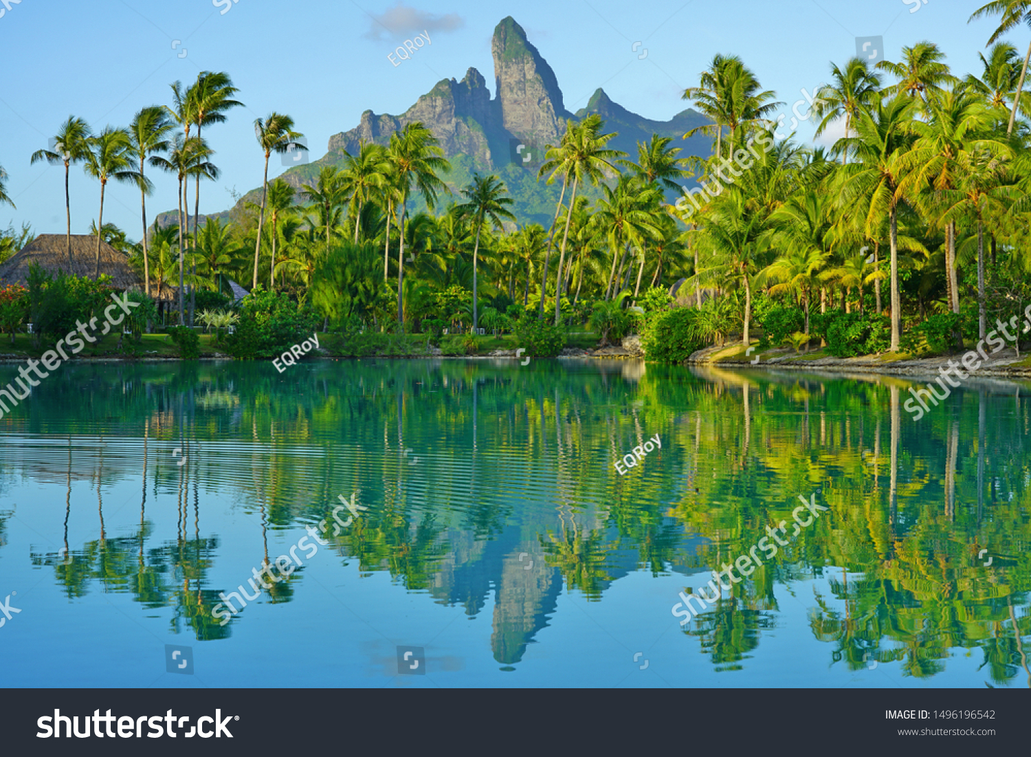 View of the Mont Otemanu mountain reflecting in water at sunset in Bora Bora, French Polynesia, South Pacific #1496196542