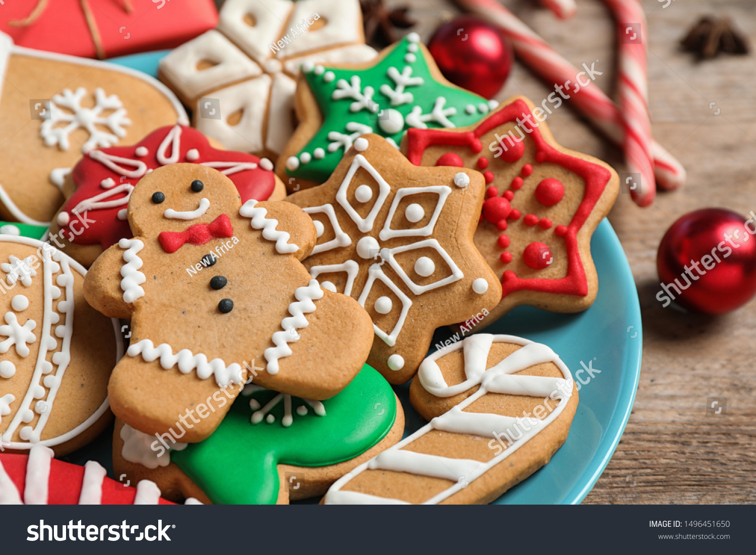 Tasty homemade Christmas cookies on blue plate, closeup view #1496451650