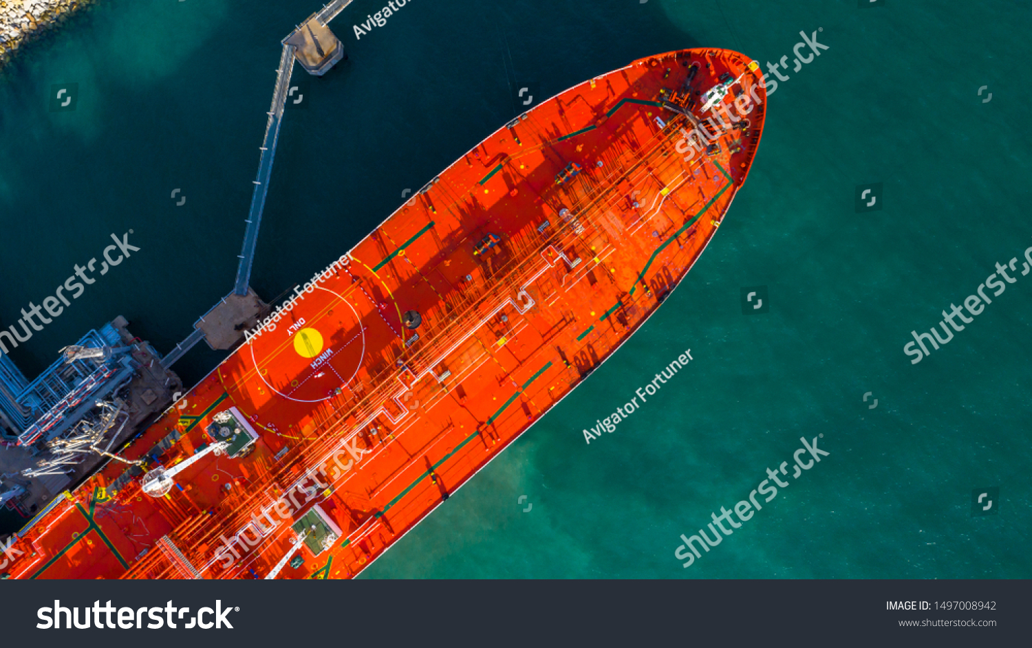 Red tanker ship loading and unloading oil and gas storage at industrial dock port, Business import export petrol and chemical by tanker ship transportation, Loading arm oil and gas offshore platforms. #1497008942