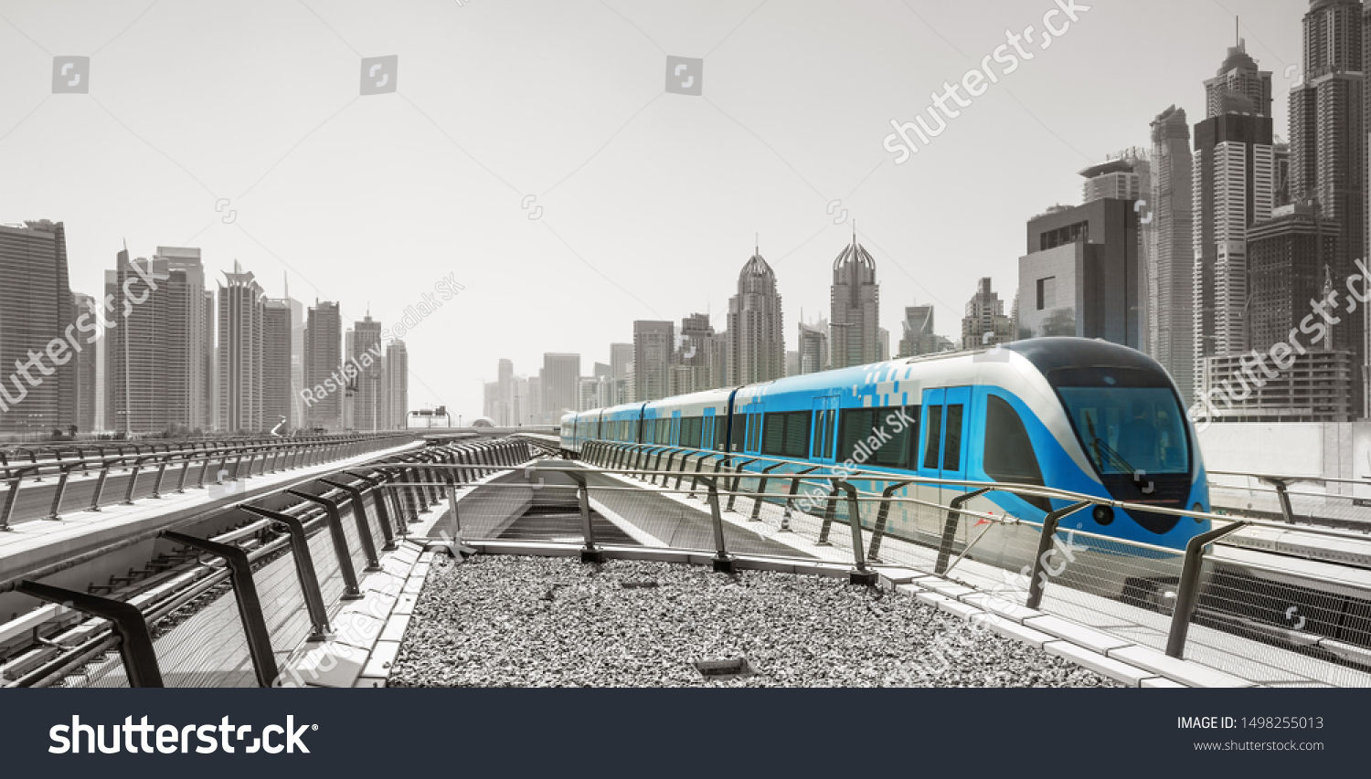 Metro railway and fully automated train in modern and luxury Dubai city, United Arab Emirates #1498255013
