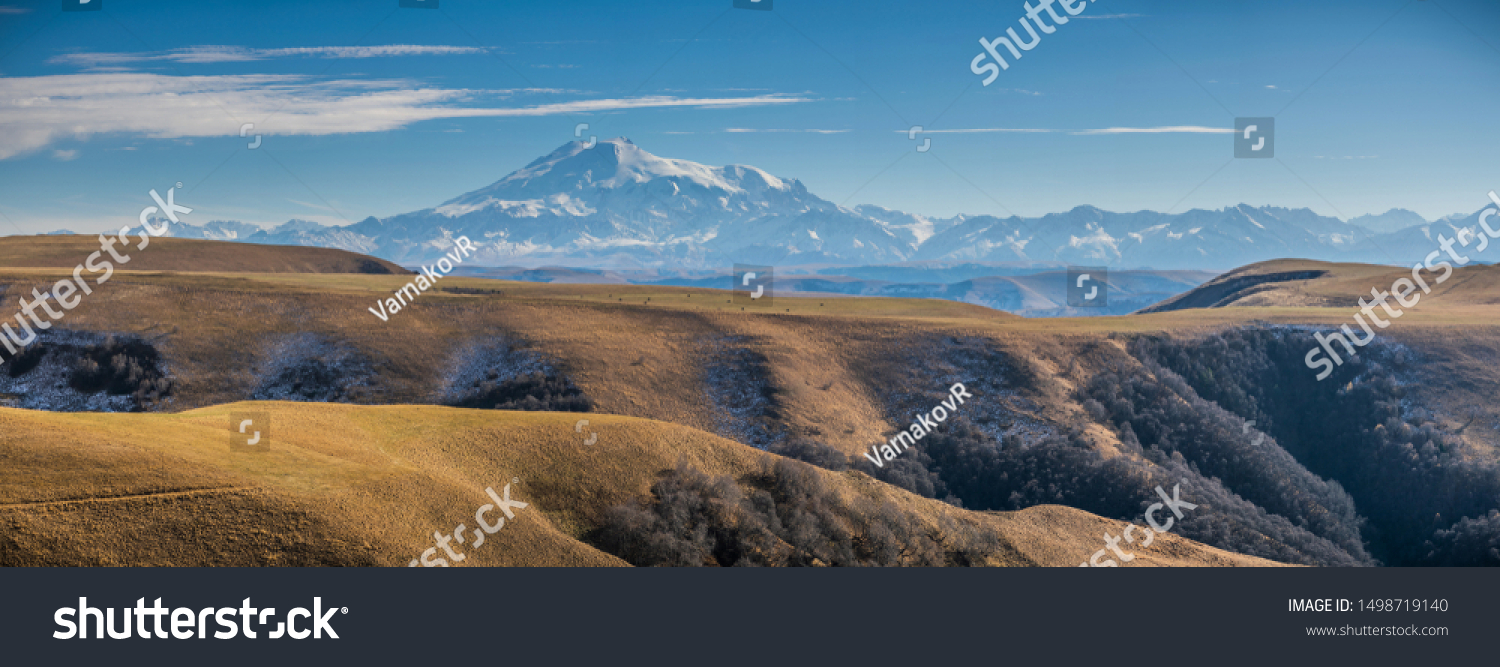 Mount Elbrus, the highest mountain in Europe, located in Caucasus mountains in Russia, panoramic landscape form plateau Bermamyt. #1498719140