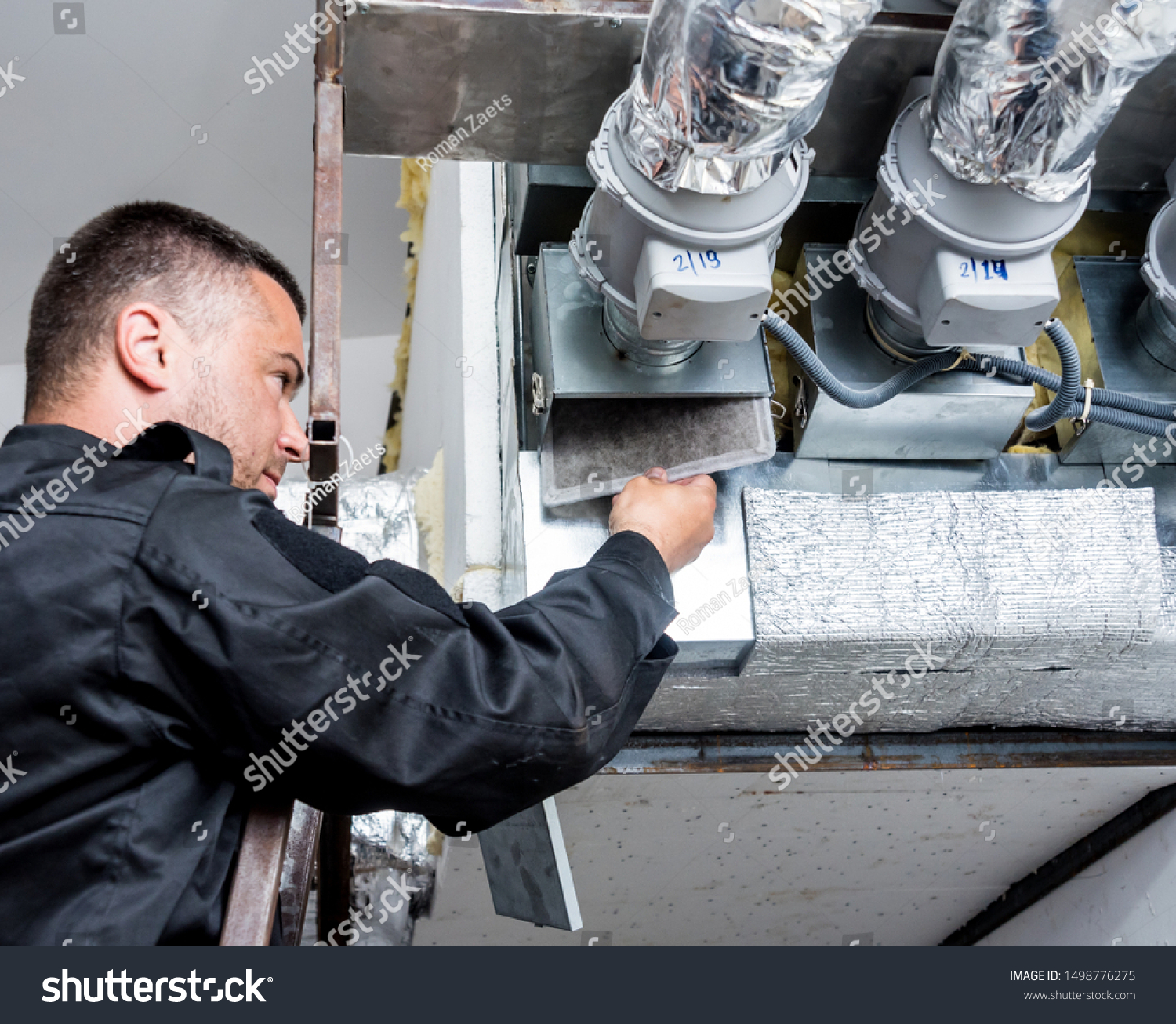 Ventilation cleaning. Specialist at work. Repair ventilation system (HVAC). Industrial background #1498776275