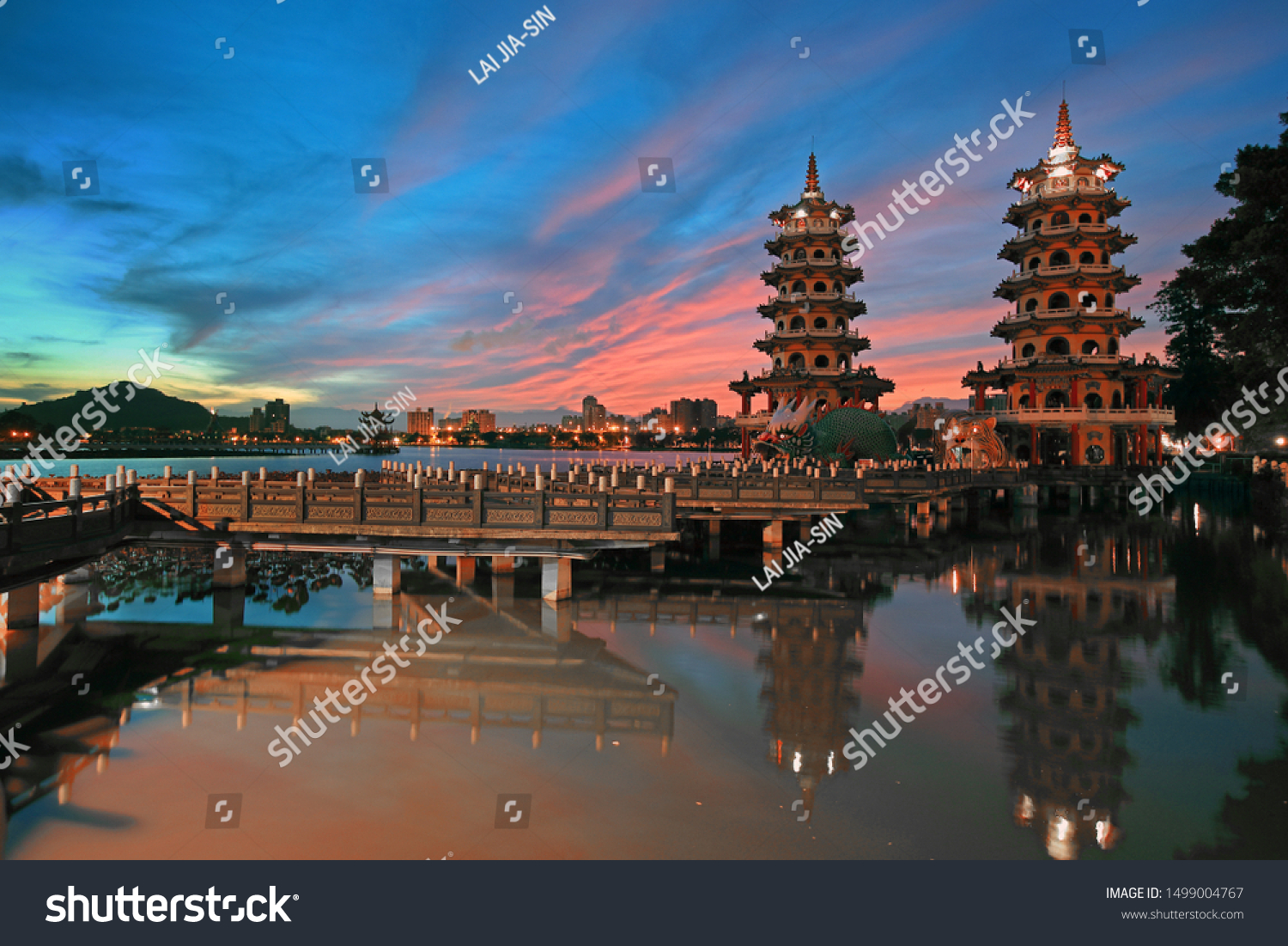 Sunrise and sunrise reflection at Dragon Tiger Tower in the lake,Taiwan #1499004767