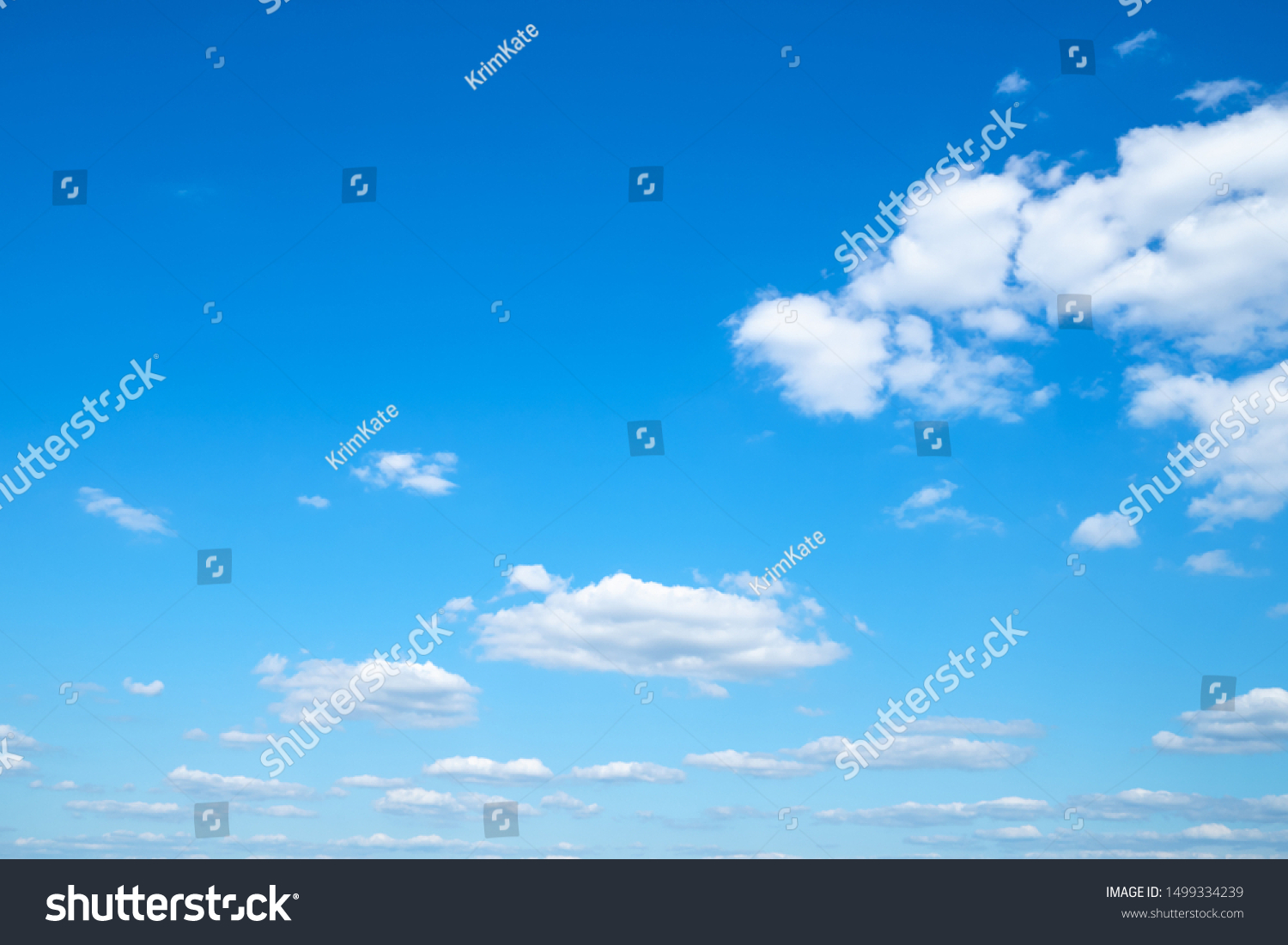 little light cumuli clouds in blue sky on sunny august day #1499334239