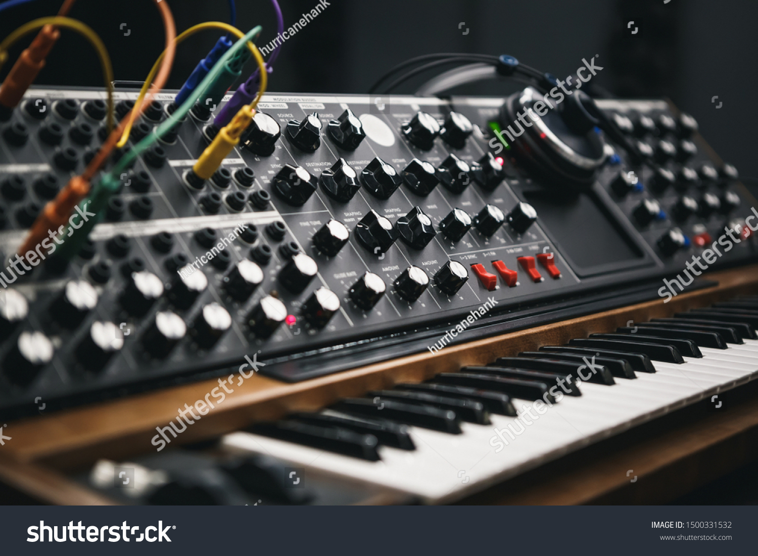 Analog synthesizer board in sound recording studio. Professional hi-fi audio equipment for music producer. Retro analog synth for producing new musical tracks in high quality #1500331532