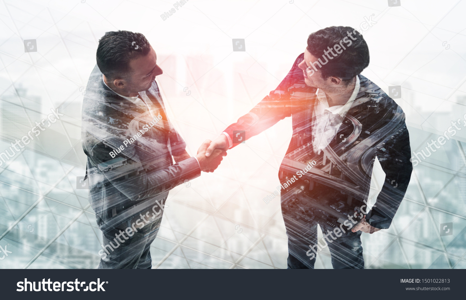 Agreement of Partnership Concept - Double exposure image of businessmen handshake. Corporate teamwork, trust partner and work agreement. #1501022813
