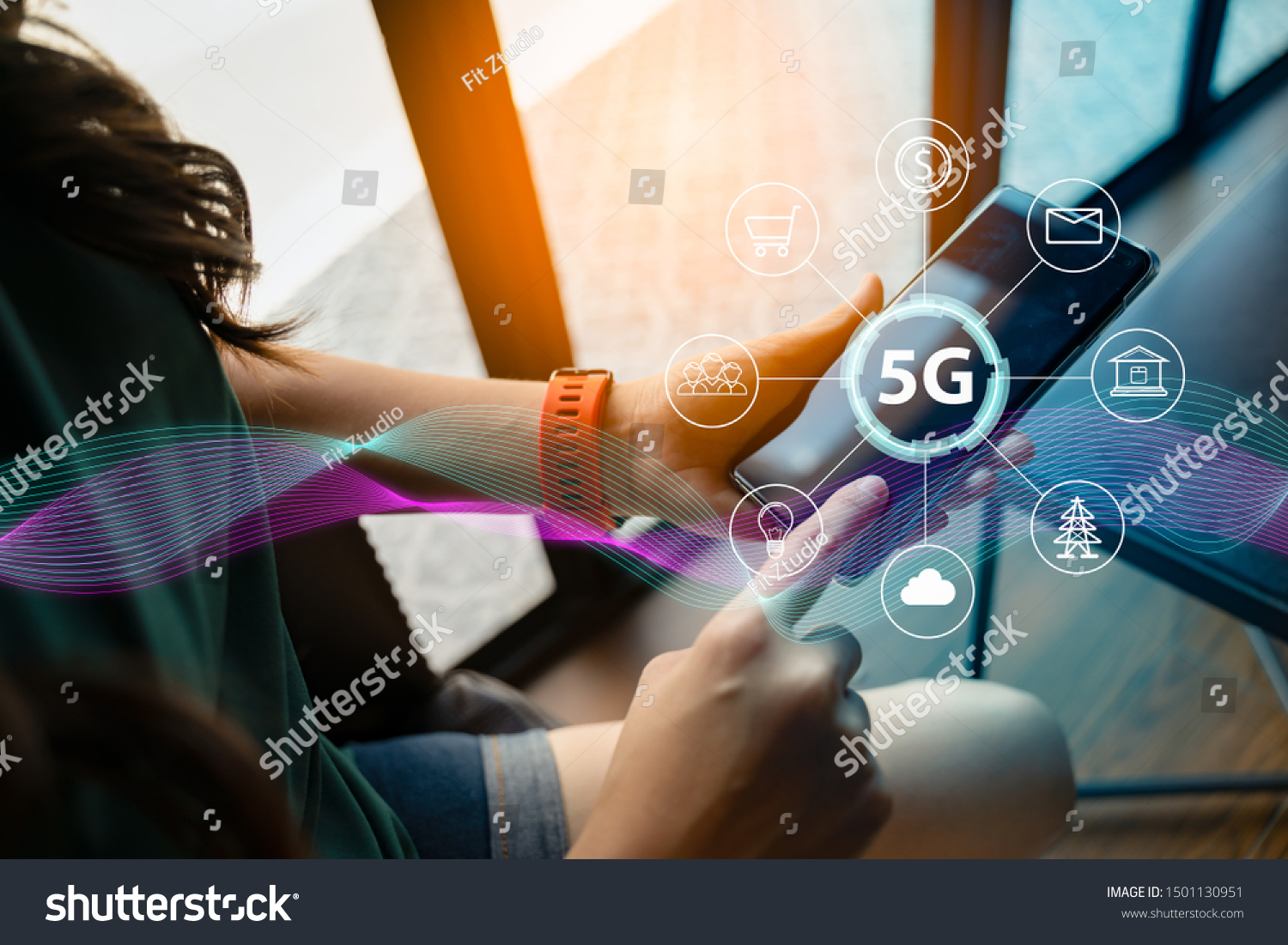 Close up of female hand holding a phone with a 5G hologram in coffee shop. 5G network wireless systems.The concept of 5G network, high-speed mobile Internet, new generation networks. #1501130951
