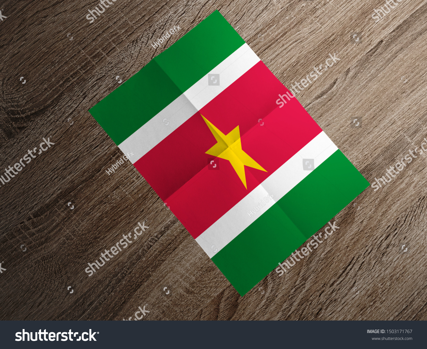 Flag of Suriname on paper. Suriname Flag on wooden table. #1503171767