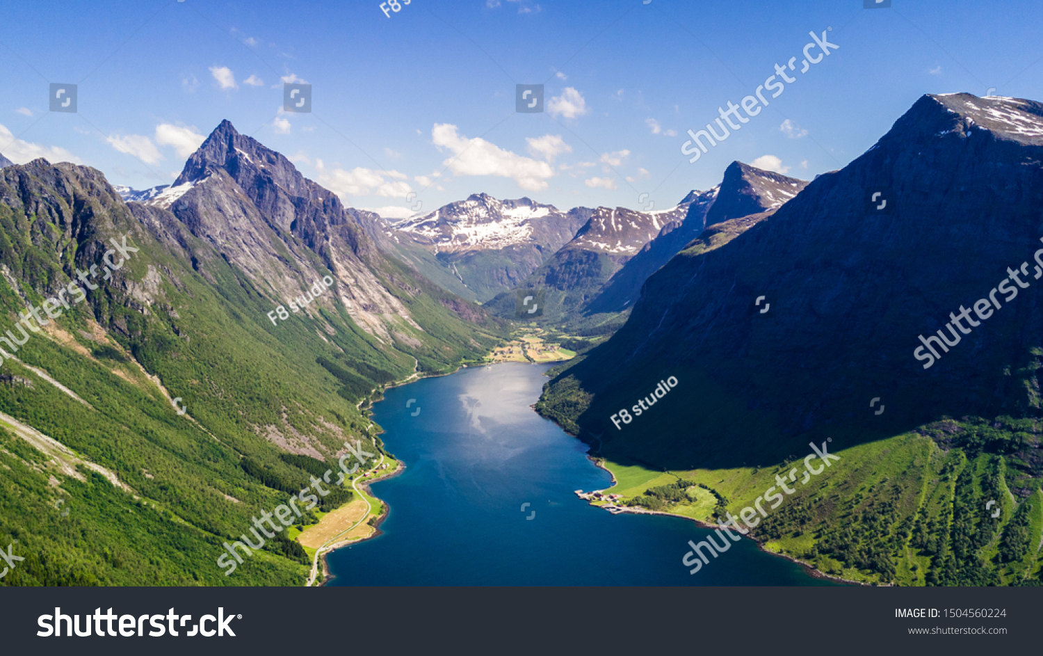 Aerial view on Geiranger town, harbor and fjord in More og Romsdal county in Norway famous for his beautiful boattrip through the fjord. #1504560224