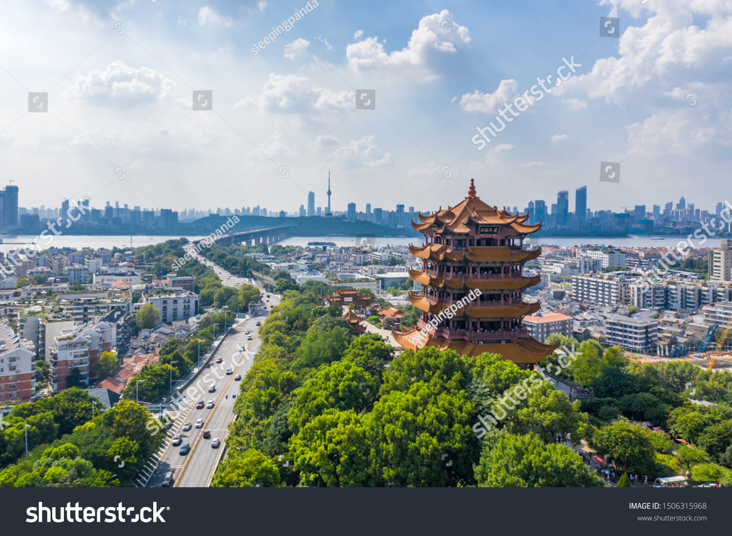 Aerial view of  Wuhan city .The yellow crane tower , located on snake hill in Wuhan, is one of the three famous towers south of yangtze river,China. #1506315968