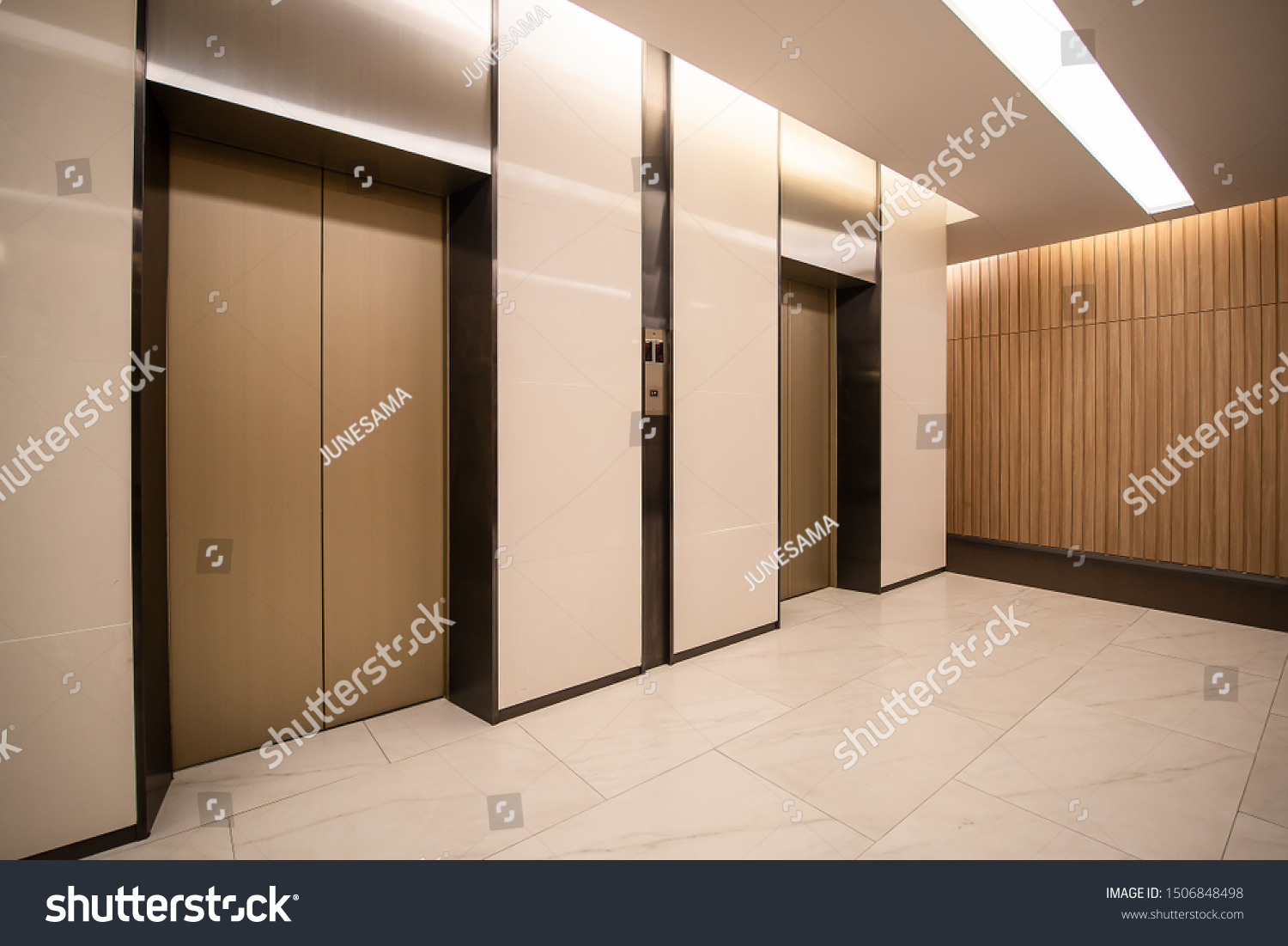 Modern steel elevator cabins in a business lobby or Hotel, Store, interior, office,perspective wide angle. Three elevators in hotel lobby #1506848498