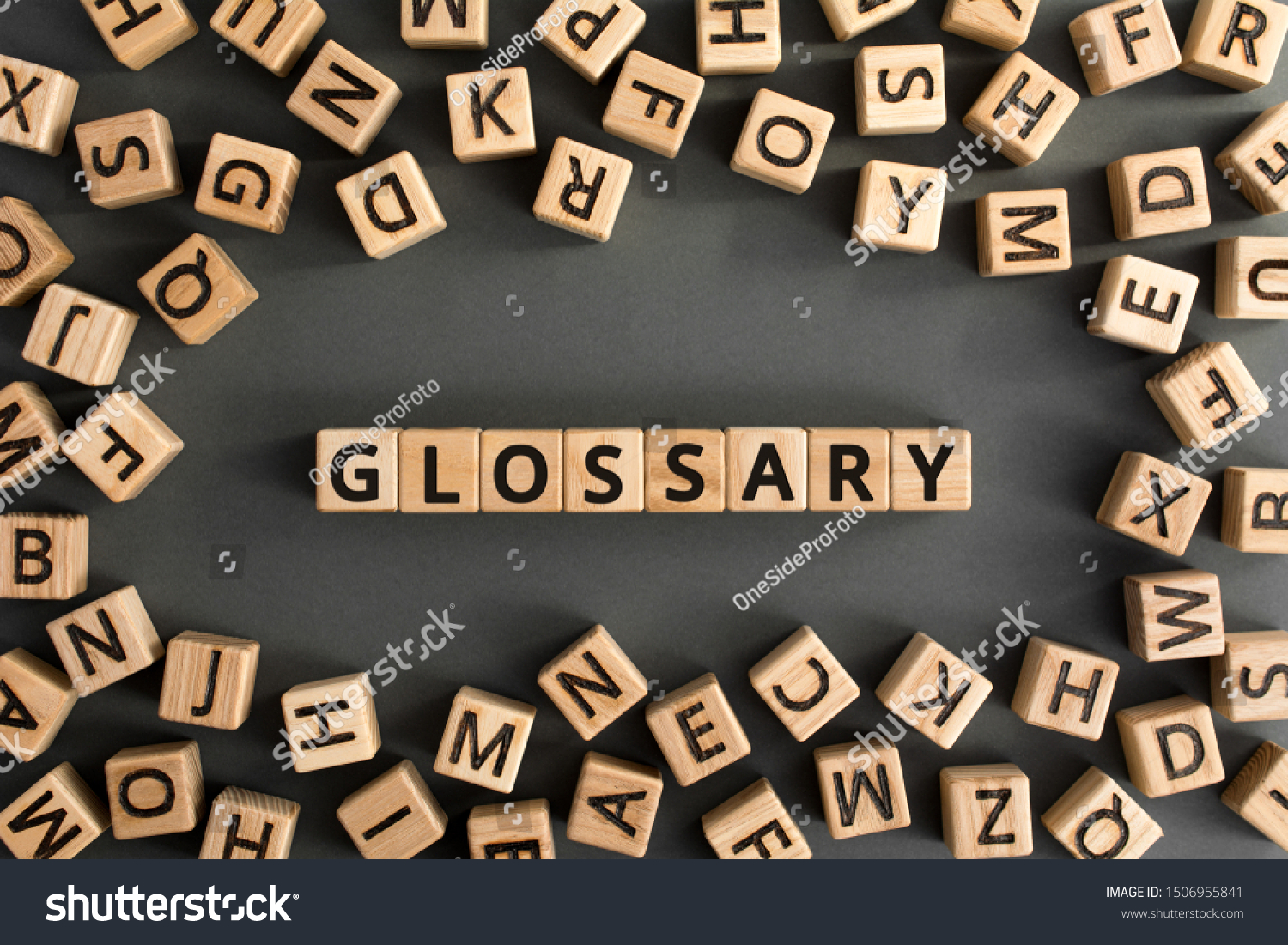 glossary-word-from-wooden-blocks-with-letters-royalty-free-stock-photo-1506955841-avopix