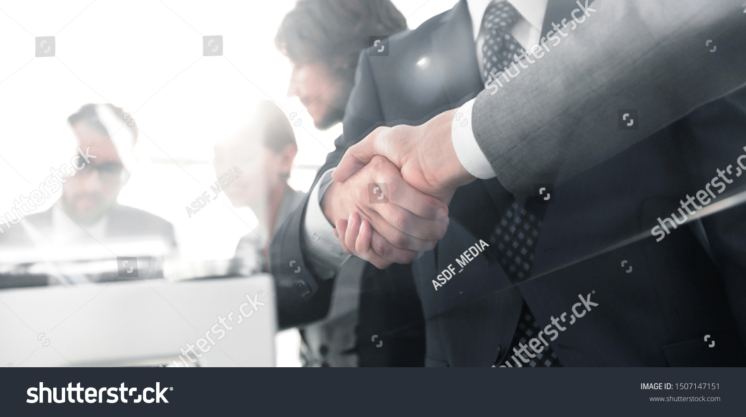 handshake of business partners in conference room #1507147151