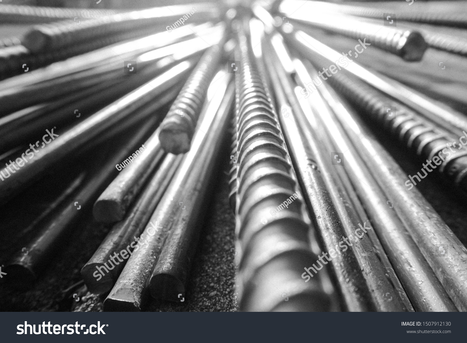 close up steel bar or steel reinforcement bar in the construction site with sunbeam at the morning, steel rods bars can use for reinforce concrete.  #1507912130
