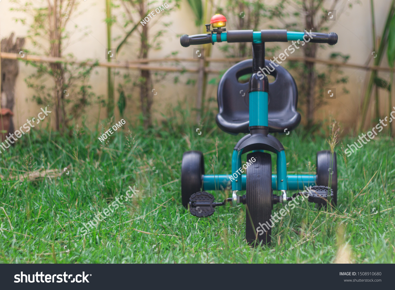 blue Black Baby Balance Bike. Children's 3 Wheeled Sliding Vehicle. Modern Kids Three Wheels Tricycle Bicycle Side View. Cycling Toddler Training Trike Bike. Infant Walker Scooter 