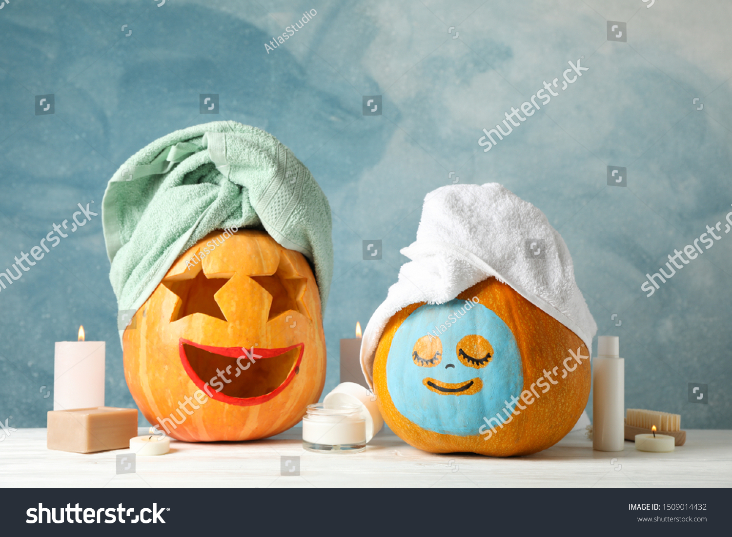 Funny pumpkins and skin care accessories on white background, copy space #1509014432