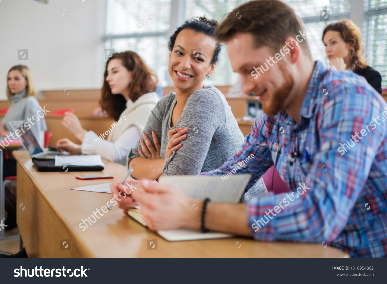 Multinational group of students in an auditorium #1510954862