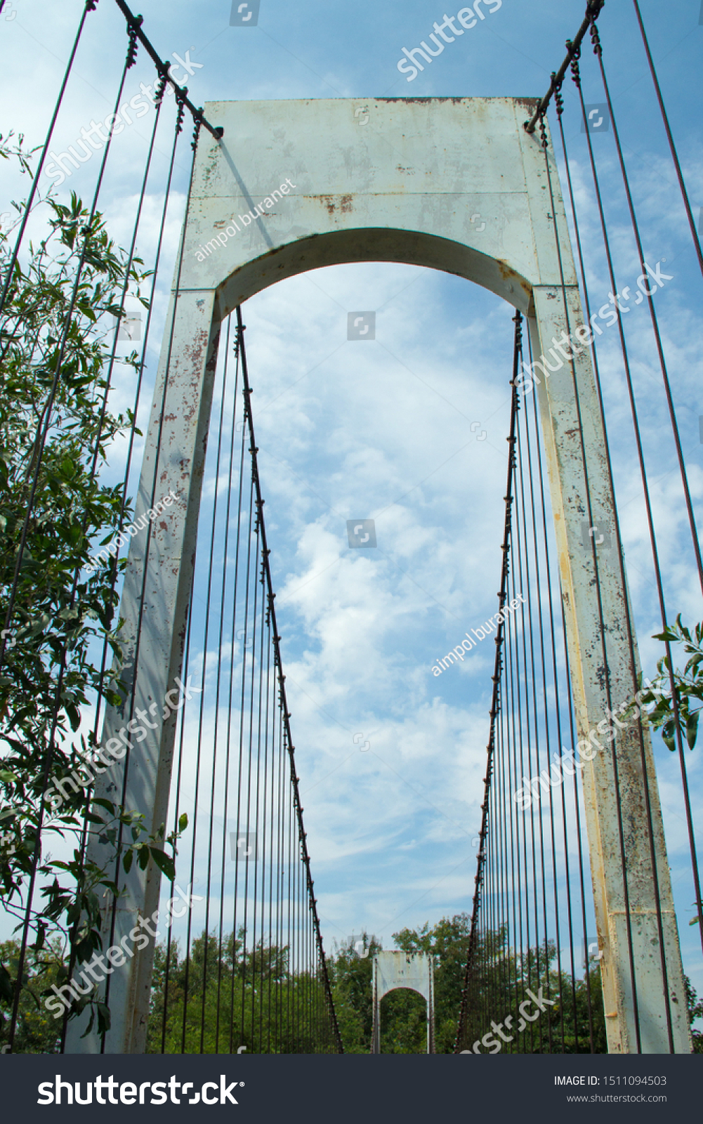 Ancient suspension bridge,Suspension bridge and blue sky. #1511094503