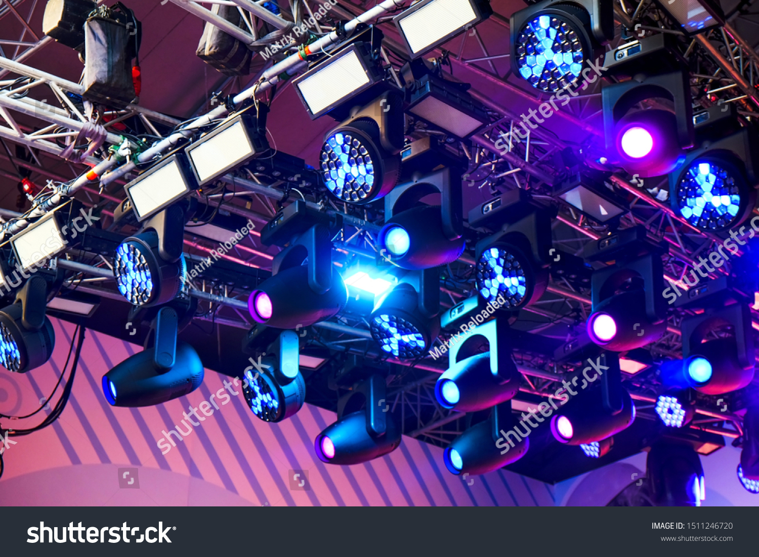 Set of professional stage lighting equipment for gig illumination.Floodlights,several powerful stage light,used to illuminate also sports field,stage,exterior of building.Stage illumination.SOFT FOCUS #1511246720