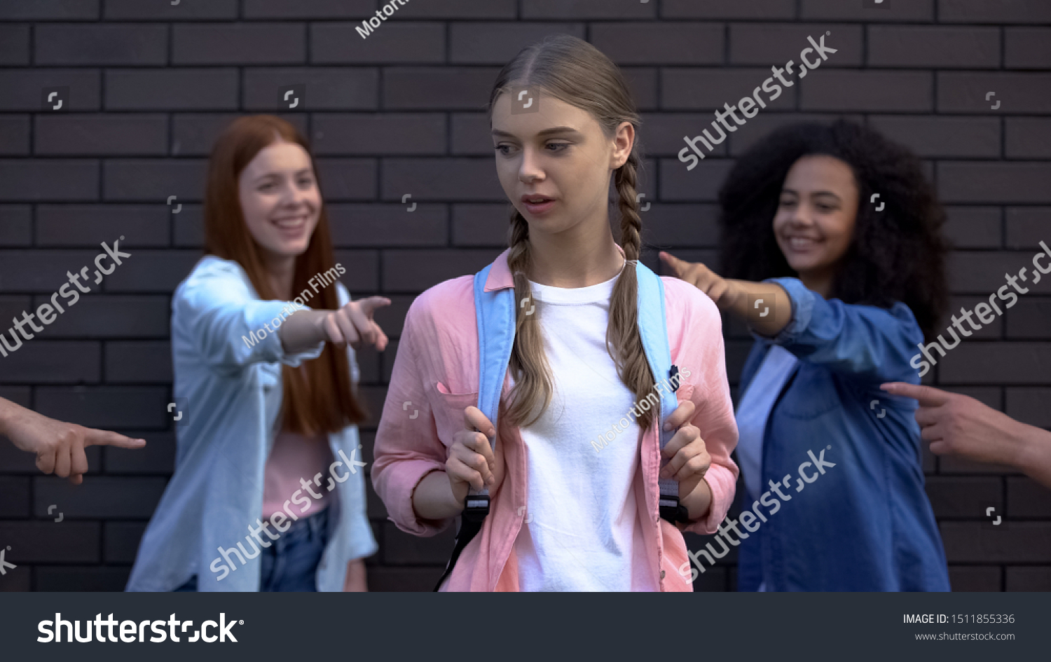 Female peers pointing fingers desperate schoolgirl, college teasing condemnation #1511855336
