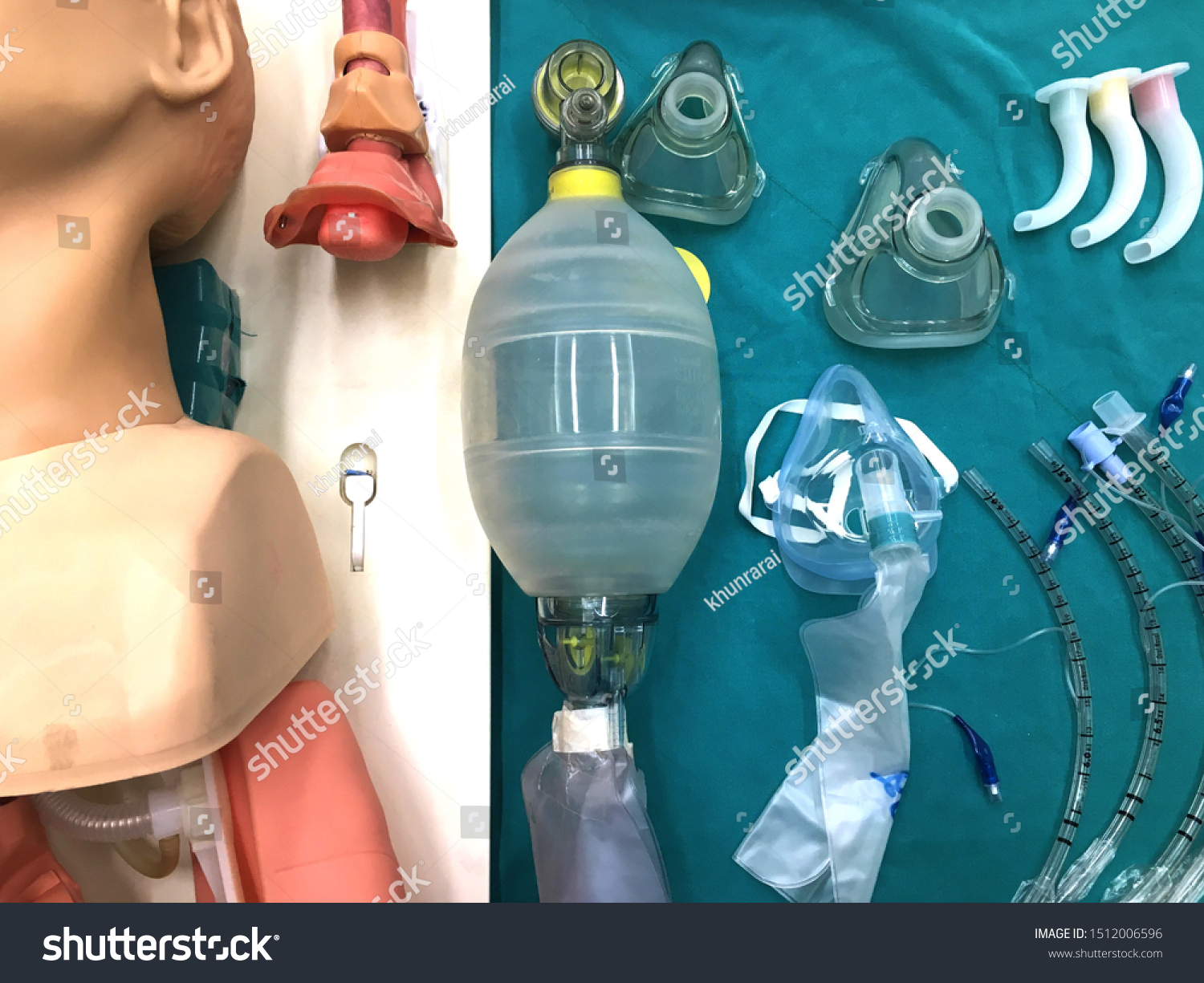 Medical equipment for airway management : model, nasopharyngeal airway, oral airway, mask with bag and endotracheal tube on table #1512006596