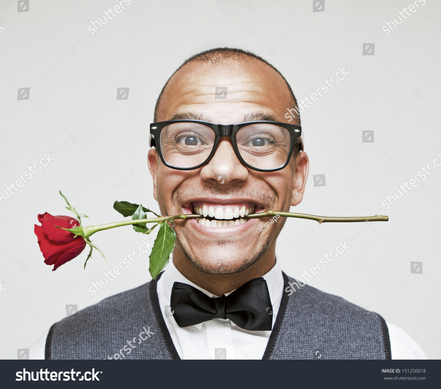 Romantic Geek in Love, holding a rose between his teeth excitedly #151250018