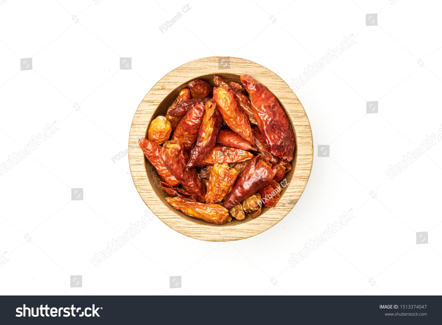 Lot of whole dry red chili pepper peperoncino in wooden bowl flatlay isolated on white background #1513374047