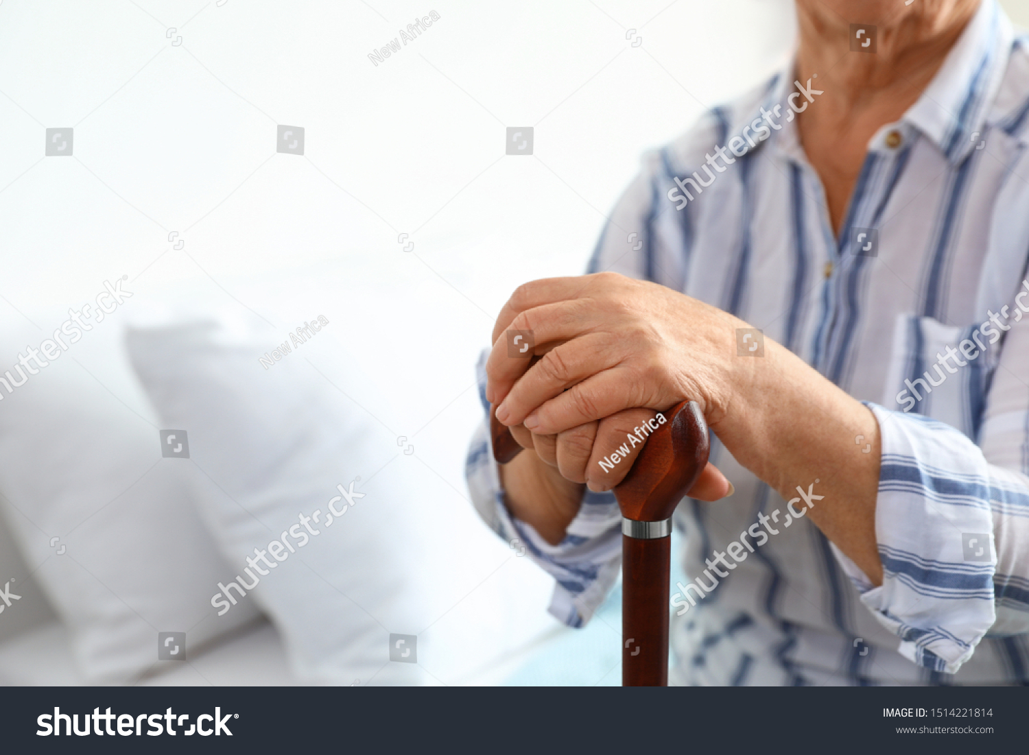 Elderly woman with walking cane in nursing home, closeup. Medical assistance #1514221814