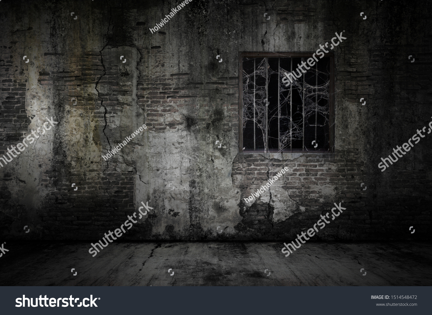 Window and rusty bars covered with cob web or spider web on prison old bricks wall and dusty floor, concept of horror and Halloween #1514548472
