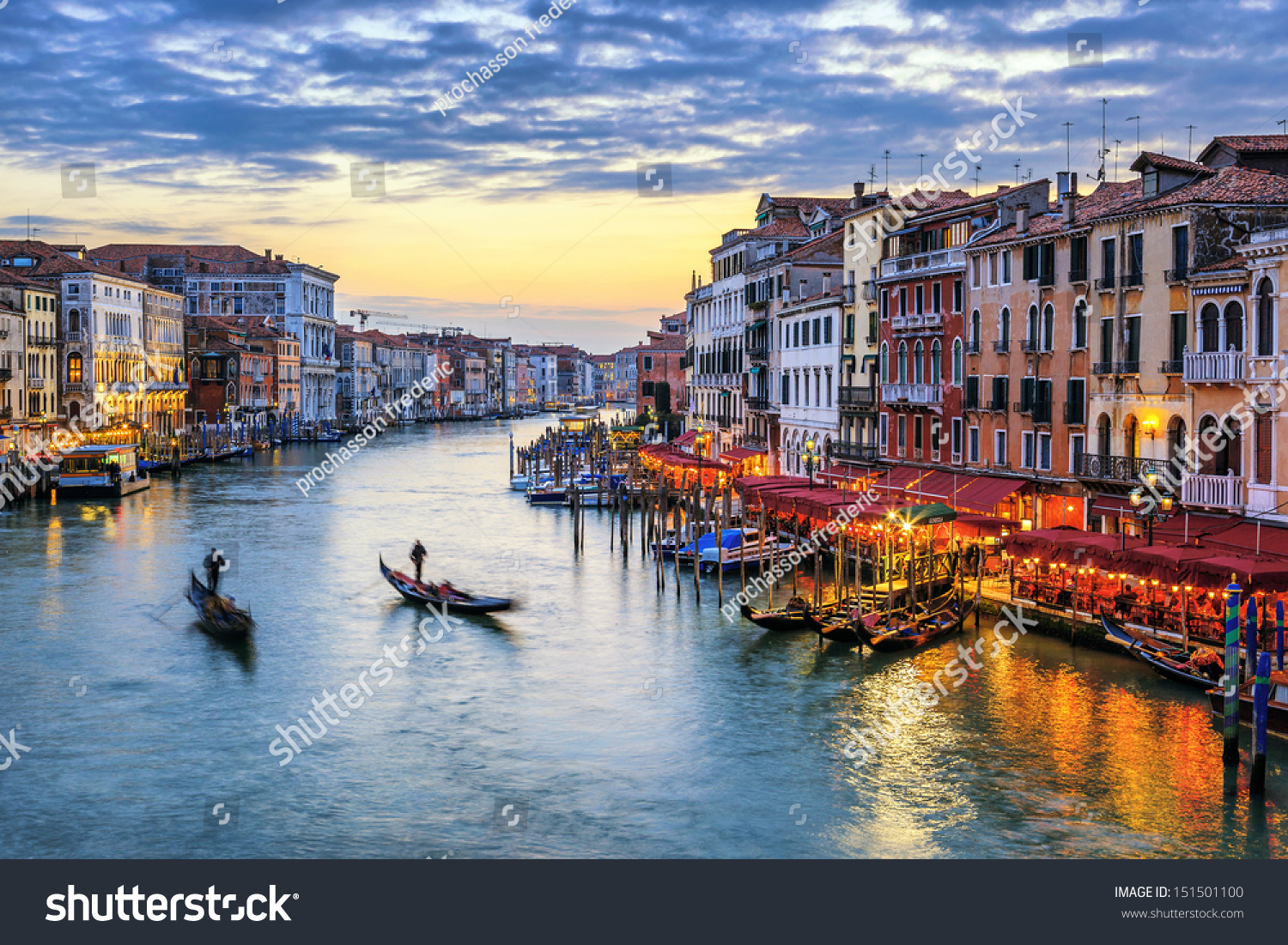 View of Grand Canal with gondolas at sunset in Venice #151501100