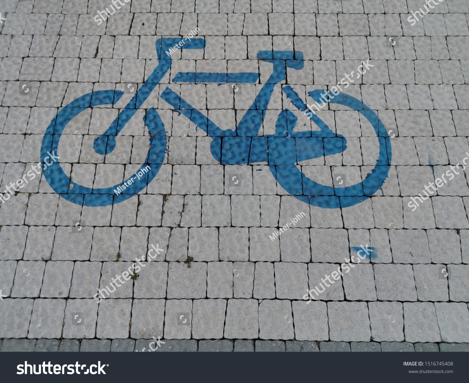 light grey block cycle way with blue painted icon symbol sign #1516745408