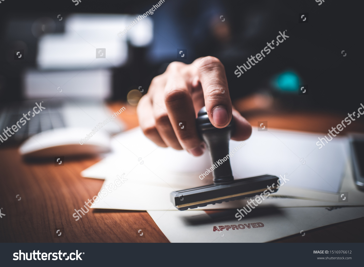 Close-up Of A Person's Hand Stamping With Approved Stamp On Text Approved Document At Desk,  Contract Form Paper #1516976612